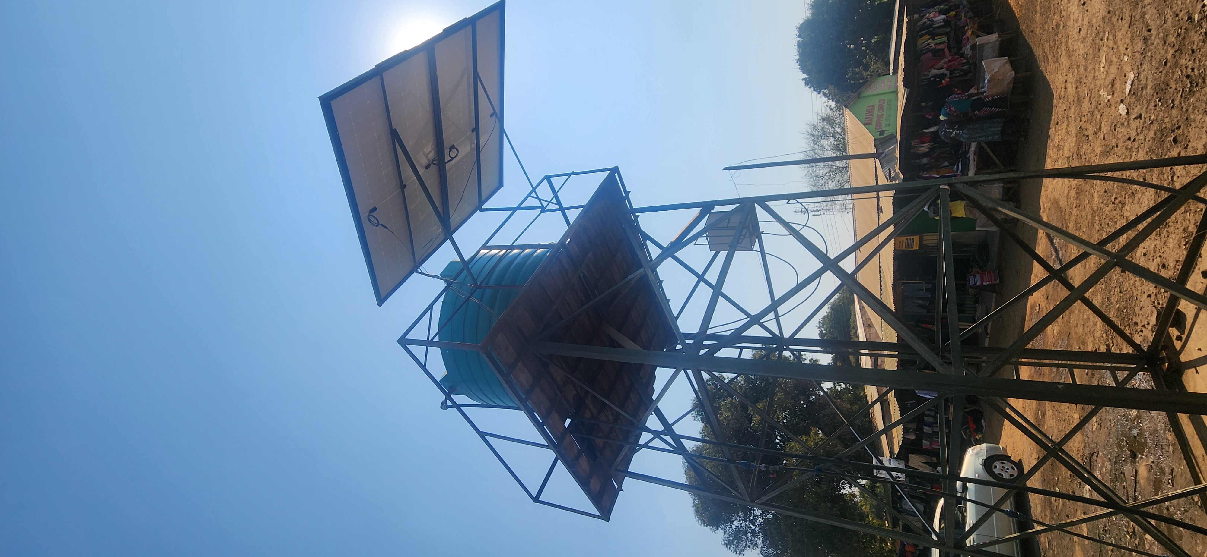 Hybridized solar pump co-op in Zambian town for potable water and hospital delivery
